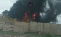Дым от пожара на асфальтобетонном заводе