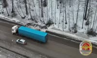 Наблюдение с помощью квадрокоптера  за участком дороги в пригороде Дивногорска
