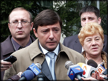 Александр Хлопонин (в центре)
