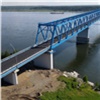 В Красноярском крае на Высокогорском мосту уложили асфальт