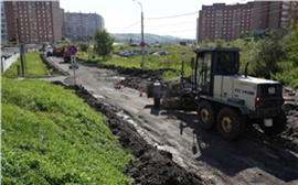 В красноярском Солнечном восстанавливают размытую ливнями дорогу